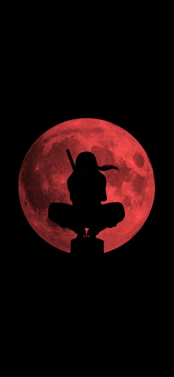 Silueta de un ninja ante una luna roja